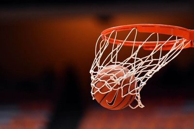 Picture of basketball going through hoop
