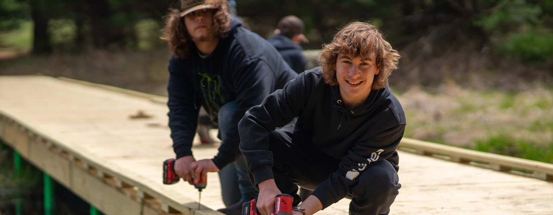 NHS students working on the NEL boardwalk